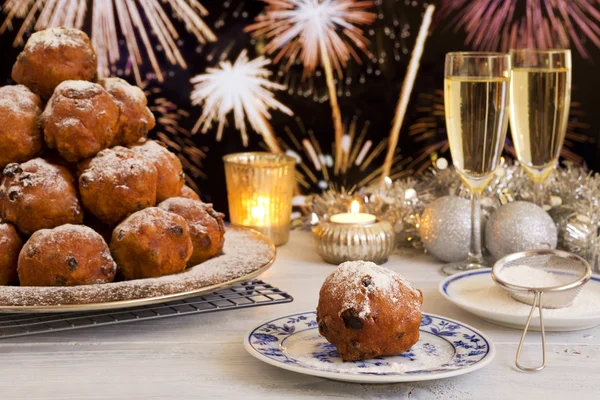 Dutch New Year 's Eve with oliebollen, a traditional pastry — стоковое фото