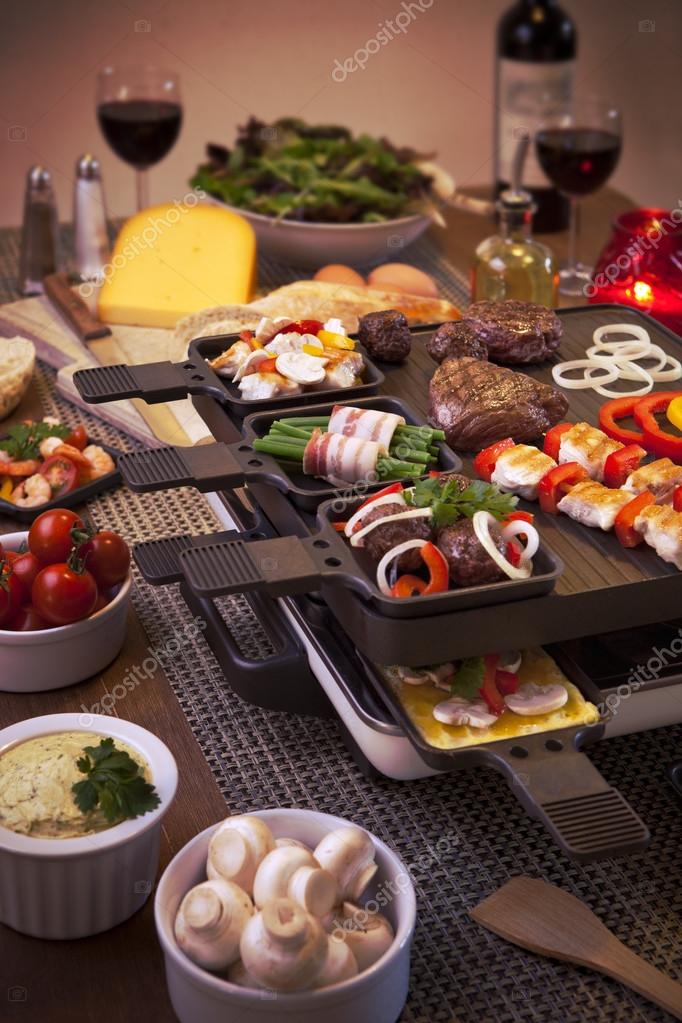 Raclette tabletop grill or the Dutch variant 'gourmetten' Stock Photo by ©sara_winter 91256828