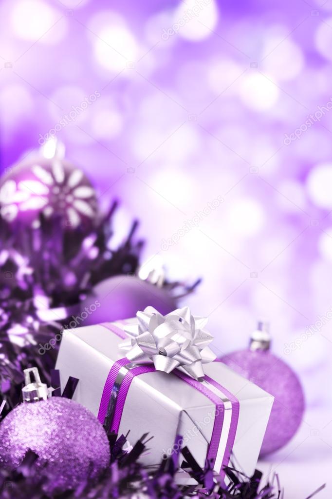 Purple Christmas scene with baubles and gift