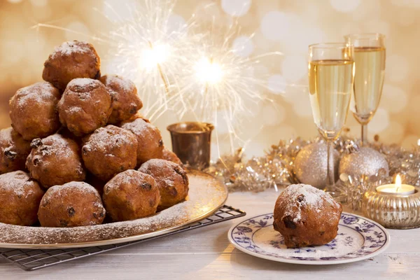Dutch New Year 's Eve with oliebollen, a traditional pastry — стоковое фото