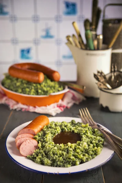 Dutch food: kale with smoked sausage or 'Boerenkool met worst' — Stok fotoğraf