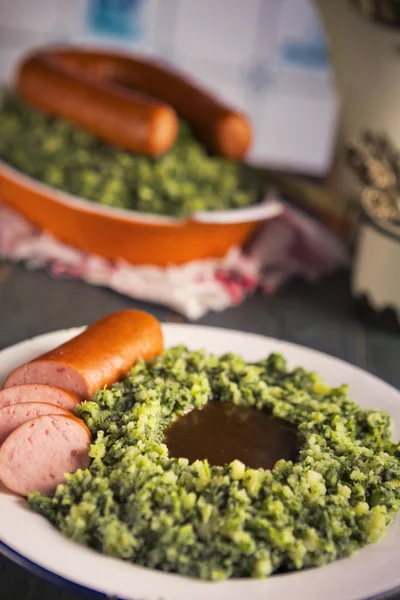 Dutch food: kale with smoked sausage or 'Boerenkool met worst' — Stok fotoğraf