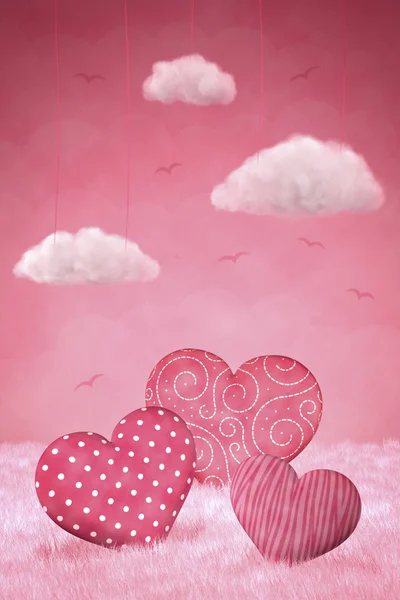Valentijnsdag harten en kaarsen met een lichte reflecterende achtergrond — Stockfoto