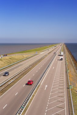 The 'Afsluitdijk' dike damming off the former Zuiderzee, The Net clipart