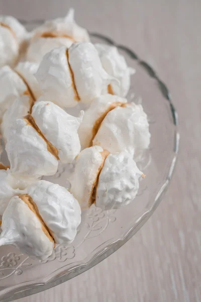 Kiss meringue cakes with cream Charlotte — Stock Photo, Image