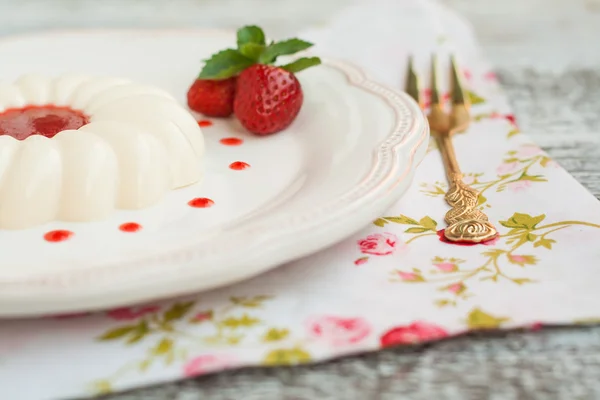 Dessert panna cotta with strawberry sauce — Stock Photo, Image