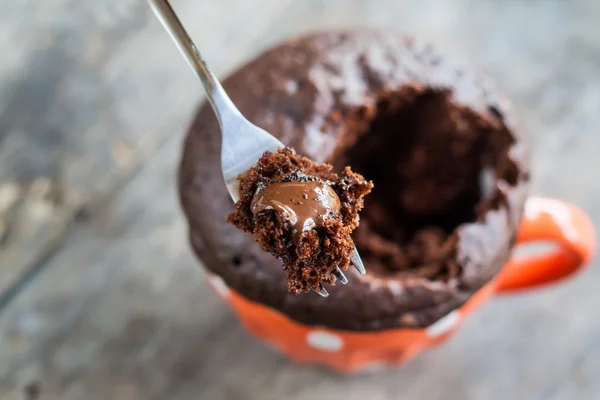 Chocolate pie in a cup filled with a liquid Royalty Free Stock Images