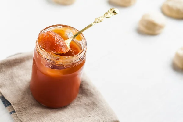 Dense jam in jar spoon — Stock Photo, Image