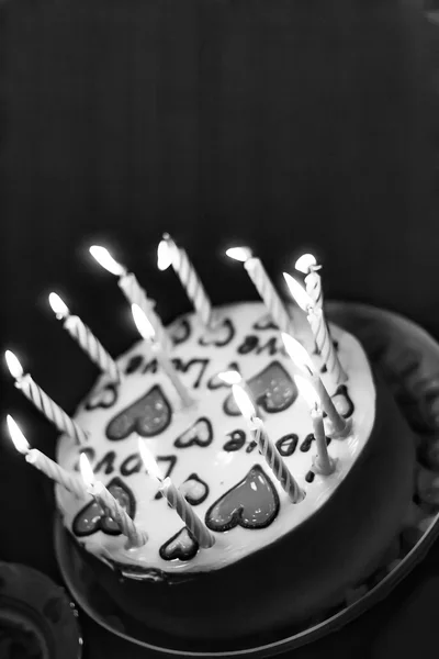 Black and white photography cake with hearts and candles — Stock Photo, Image