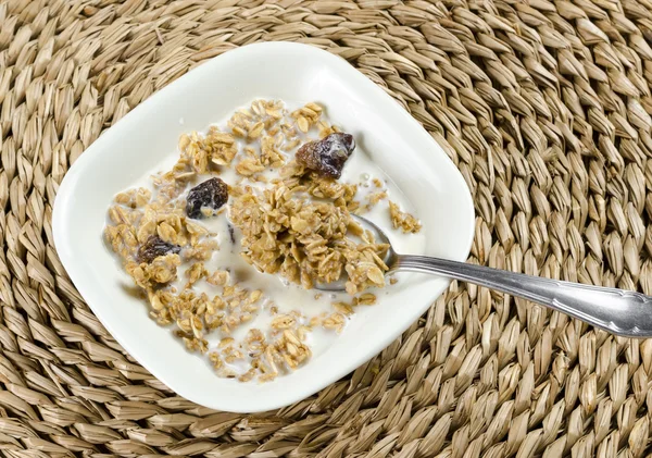 Cereals, nuts and raisin with milk — Stock Photo, Image