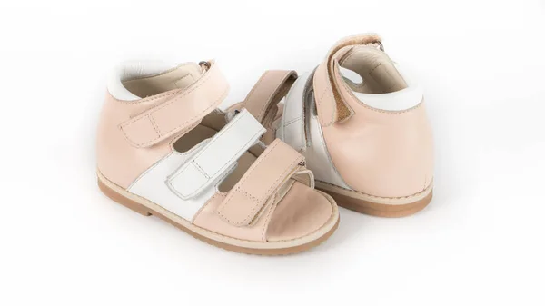 Childrens beige orthopedic sandals on a white background — Stock Photo, Image