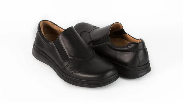 Czarne buty ortopedyczne dla dzieci na białym tle — Zdjęcie stockowe
