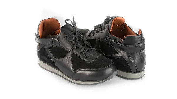 Childrens black orthopedic shoes on a white background — Stock Photo, Image