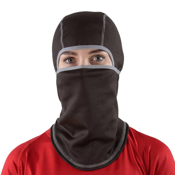 Pretty brunette with long hair in a red shirt with a black balaclava with gray edging — Stock Photo, Image