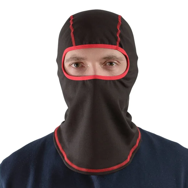 Brunette man in a blue shirt with a black balaclava with red edging — Stock Photo, Image