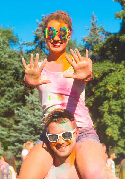 Portrait of happy couple in love on holi festival — ストック写真