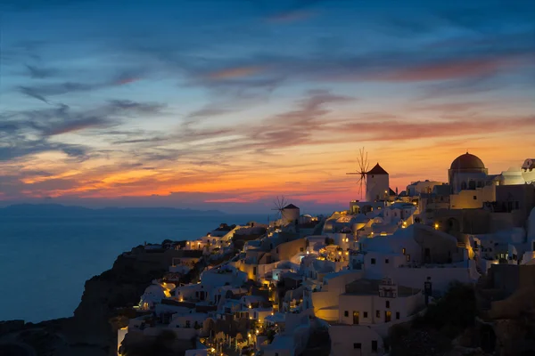 Lights of Oia village at night, Santorini, Greece. — Stock Photo, Image