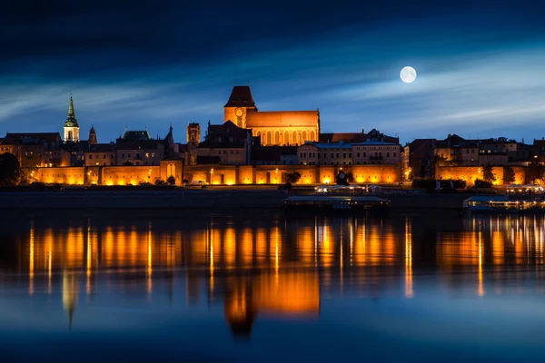 Old town reflected in river at sunset. — Stok fotoğraf