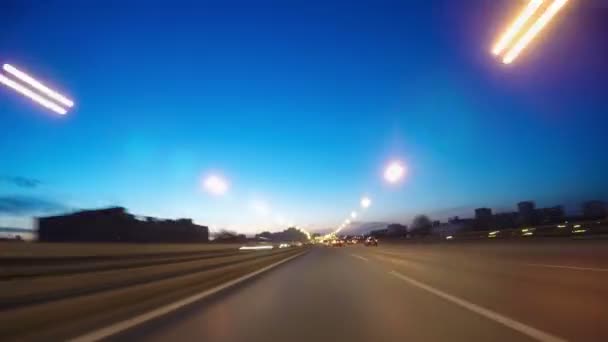 Night road POV through the city at night timelapse — Stock Video