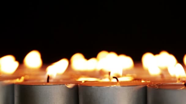 Slow rotation of the candles on black background 2. — Stock Video