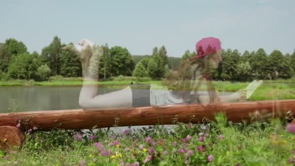 Magic bench. Girl appears and disappears. Young girl lying on bench and reading — Stock Video