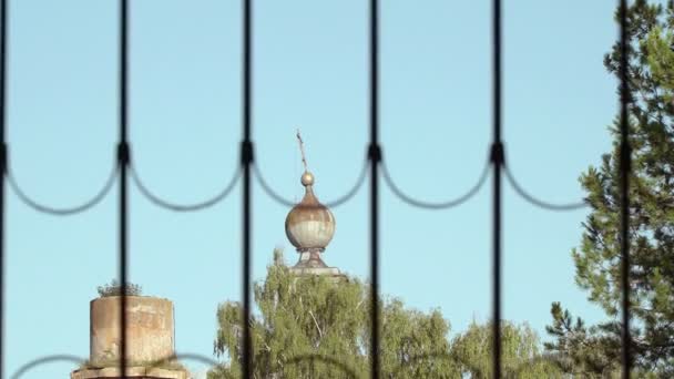 Ruins of the old Church through a window with bars — Stock Video