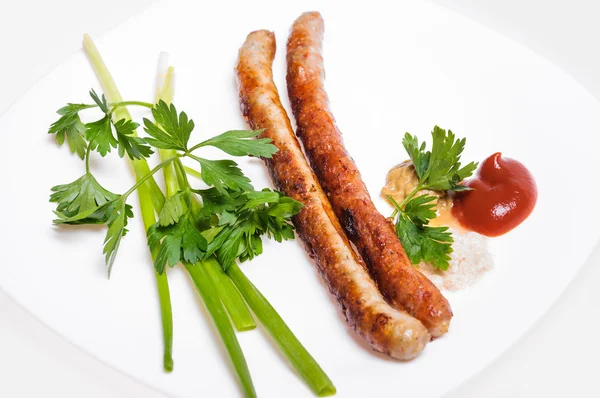 Fried Munich sausages with vegetables and sauces — Stock Photo, Image
