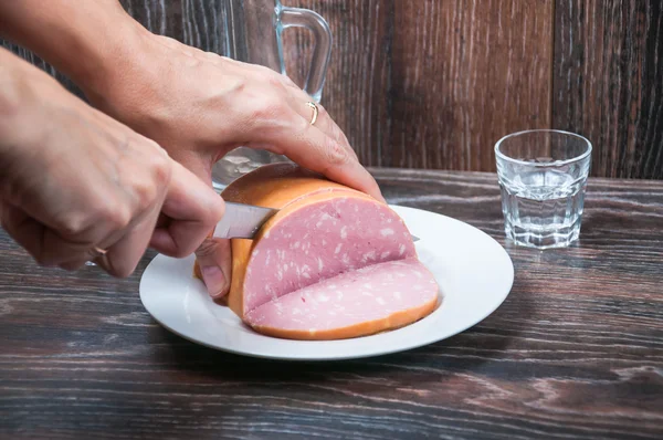 Cutting of boiled sausage — Stock Photo, Image