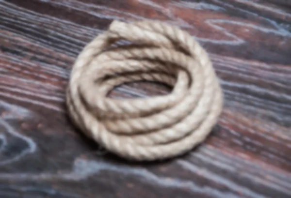 Rope on wooden boards in refocuse — Stock Photo, Image