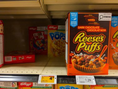 Kanada, 12 Mart 2026: Reese 's Puffs, mısır gevreği rafları, meyveli gevrek, mısır gevreği, fiyat etiketi