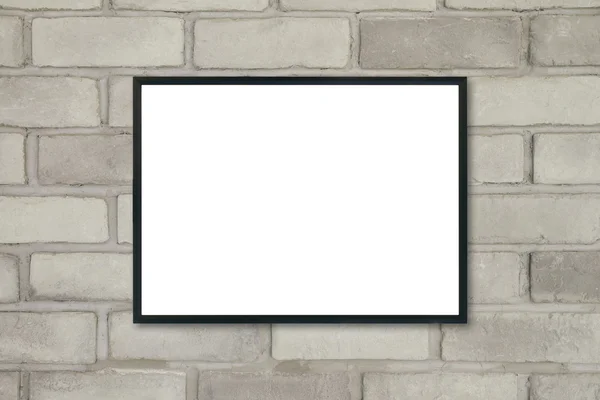 Maquillaje en blanco cartel marco de la imagen en la pared de ladrillo . —  Fotos de Stock