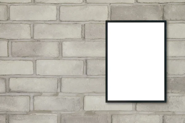 Mock up quadro de imagem de cartaz em branco na parede de tijolo . — Fotografia de Stock