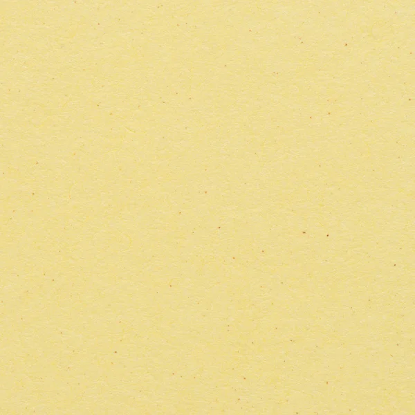 Texture du papier - fond de feuille kraft jaune . — Photo
