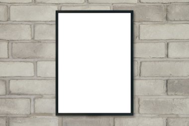 Boş poster resim çerçevesi üzerinde tuğla duvar kadar alay.