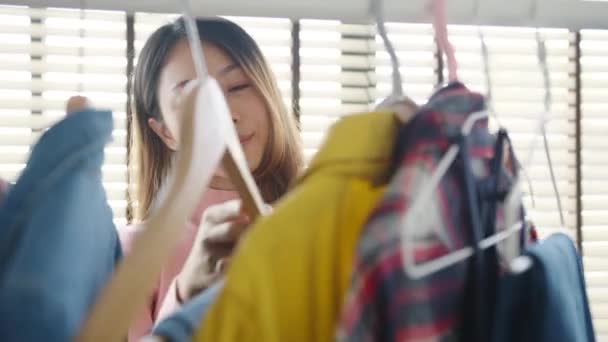 Beautiful Attractive Young Asia Lady Choosing Her Fashion Outfit Clothes — Stock Video