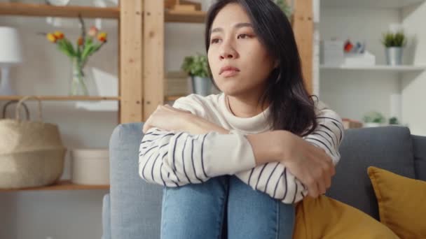 Thoughtful Asia Lady Sit Embracing Knees Sofa Living Room House — Stock Video