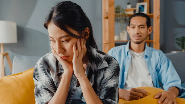 Upset Asian Couple Wife Sit Couch Listen Furious Husband Yelling — Stock Photo, Image