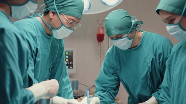 Young Asian Assistants Nurses Performing Invasive Surgery Patient Hospital Operating — Stock Video