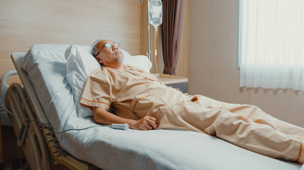 Sad Senior Asia Man Having Having Heart Attack Lying Hospital Stock Picture