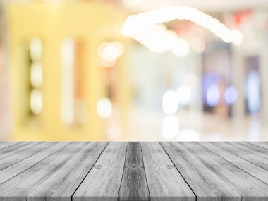 Wooden board empty table in front of blurred background. Perspective grey wood over blur in coffee shop - can be used for display or montage your products.Mock up for display product.