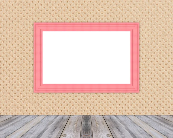 Blank red wooden photo frame leaning at cloth wall and diagonal wood floor, Mock up for adding your design — стоковое фото