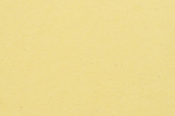 Texture du papier - fond de feuille kraft jaune . — Photo