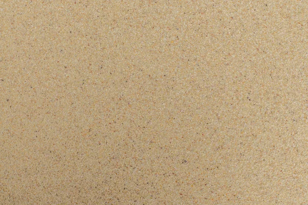 Closeup of sand pattern of a beach in the summer. Beach background. — Stock Photo, Image