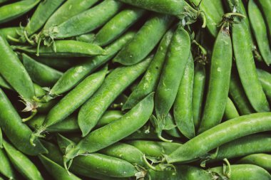 Yeşil bezelye arkaplan deseni ya da maketi. Üst Manzara. Yaz Sağlıklı Vejetaryen Yemekleri Konsepti. 