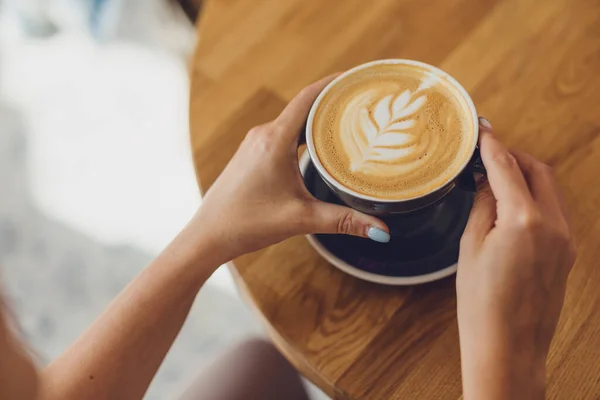 Tasty Fresh Cappuccino Cup Wooden Table Unrecognizable Woman Holding Cup — Stock Photo, Image