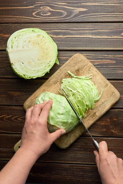 Persons Hands Chopping Fresh Cabbage Salad Wooden Background Top View — Stock Photo, Image