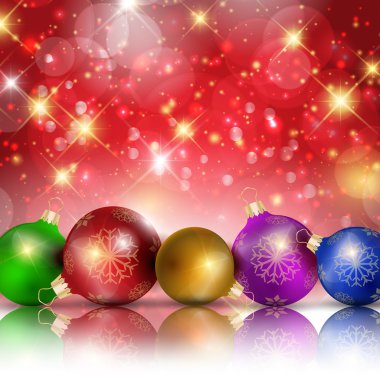 Kırmızı parlak zemin üzerine çok renkli Noel topları