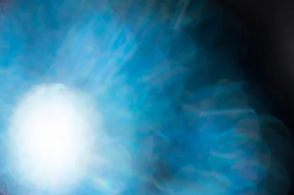 Soyut bokeh mavi parlaklık Noel oyuncaklar