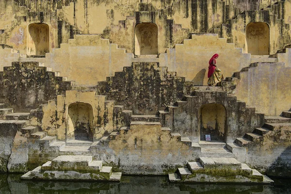 Local Women crossing step wells of Panna Meena Ka Khun.