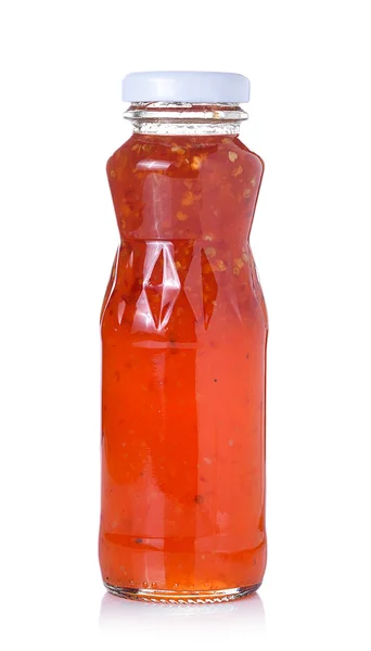 Bottle chili sauce on white background